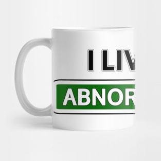 I live on Abnormal Ave Mug